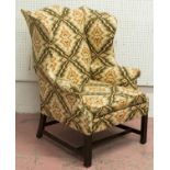 WING ARMCHAIR, Gorge III style mahogany, with cushion seat, in geometric patterned fabric, 110cm H x