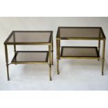 LAMP TABLES, a pair, 1970's lacquered brass each with sepia glass top, reeded columns and undertier,