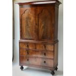 LINEN PRESS, William IV flame mahogany with two panelled doors enclosing original sliding trays, the
