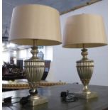 TABLE LAMPS, a pair, urn shaped with silvered finish, 76cm H overall including shades. (2)