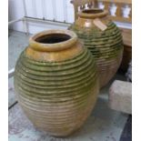 OLIVE JARS, a near pair, terracotta, 85cm H. (with slight faults) (2)
