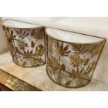 PALM SPRINGS STYLE DEMI LUNE SIDE TABLES, a pair, gilt metal with mirrored tops, 77cm H x 86cm W x