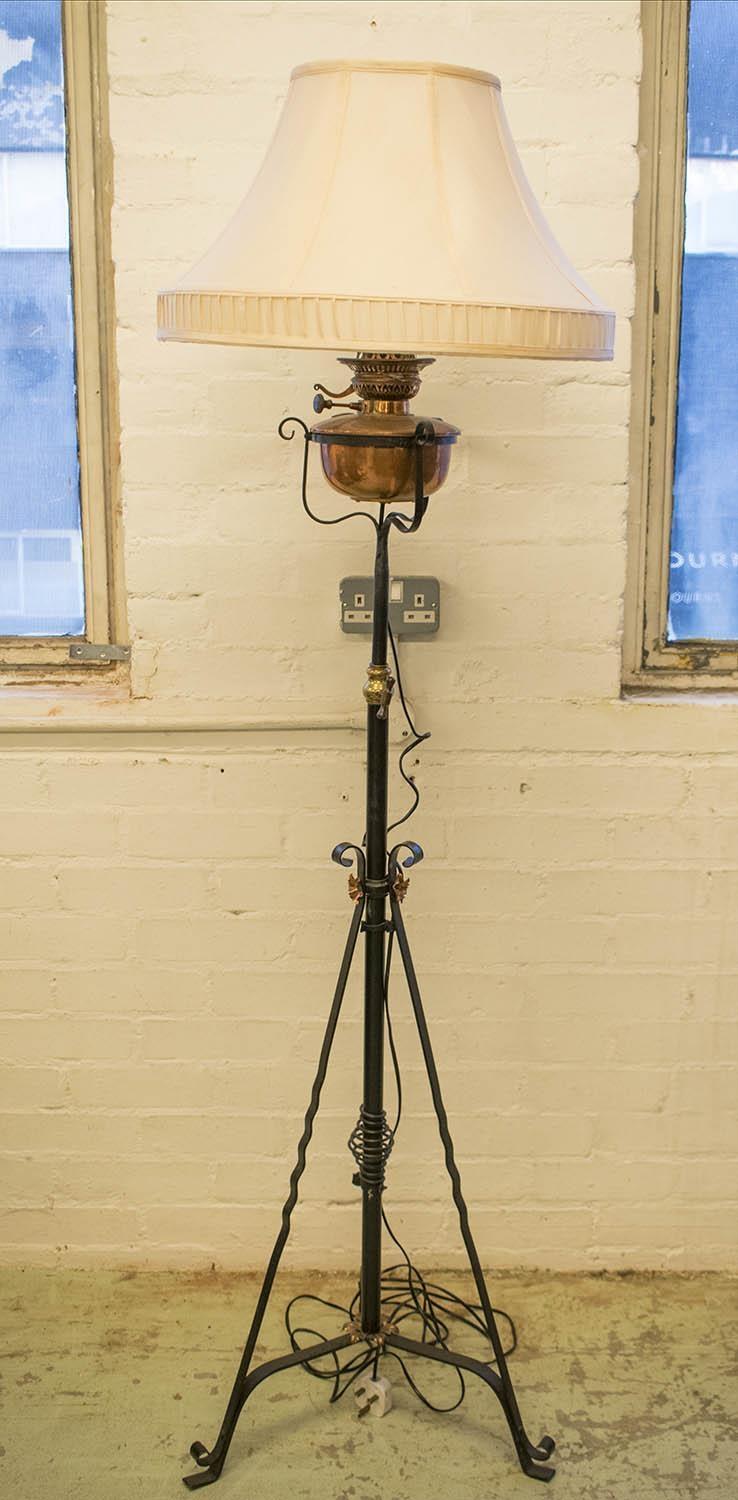 STANDING LAMP, early/mid 20th century black metal and copper with height adjustable stem and