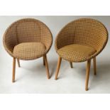 BASKET CHAIRS, 1970's, a pair, woven cane and orange and chequer design on splay supports, slight