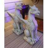 GRIFFINS, a pair, contemporary composite stone, 76cm H. (2)