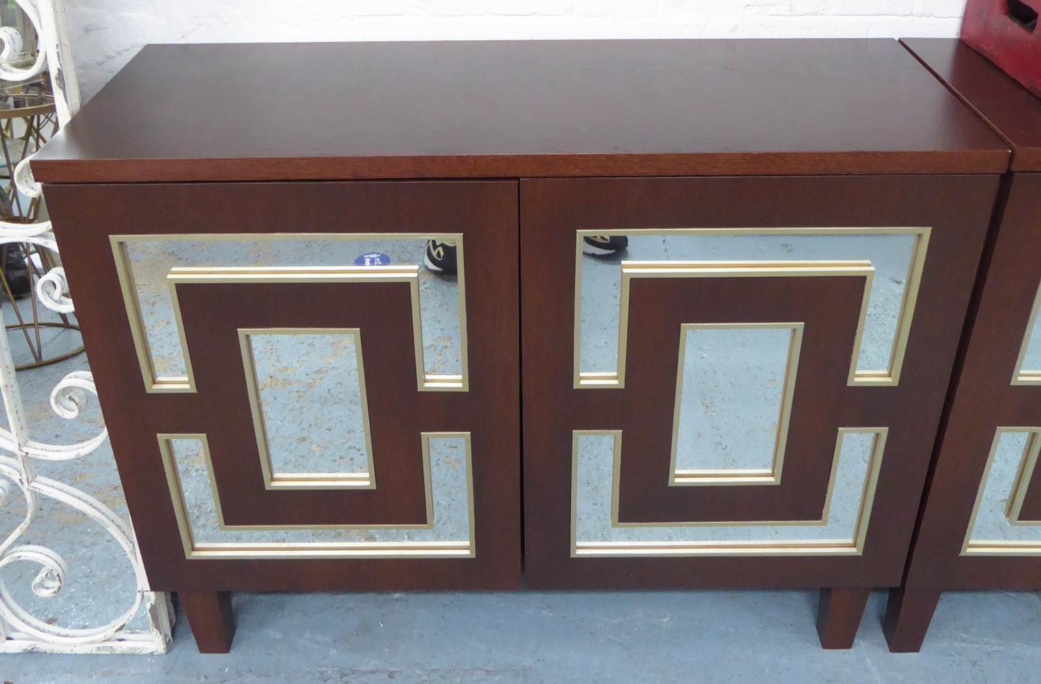 SIDE CABINETS, a pair, each with a pair of doors with mirrored detail, 39cm x 81cm H x 102cm. (2)