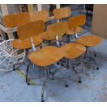 MACHINISTS CHAIRS, a set of six, vintage 20th century, approx 79cm H at tallest. (6) (with faults)