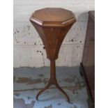 WITHDRAWN WORK TABLE, 19th century satinwood of faceted octagonal trumpet form, with a rising lid