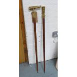 TELESCOPE WALKING CANES, a pair, with concealed telescopes in the handles, 99cm long. (2)