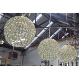 CEILING PENDANT LIGHTS, a set of three, cut glass crystals in gilt frames, 125cm drop. (3)