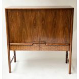 DRINKS CABINET BY MACKINTOSH, 1970's rosewood with two panelled doors above two chequer front