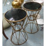 SIDE TABLES, a pair, trapeze design, gilt metal, smoked glass tops, 65cm H x 40cm diam. (2)