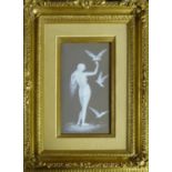 'Doves Landing on a Lady's Hand', ceramic, initialled 'M.B.', 26cm x 14.5cm, framed.