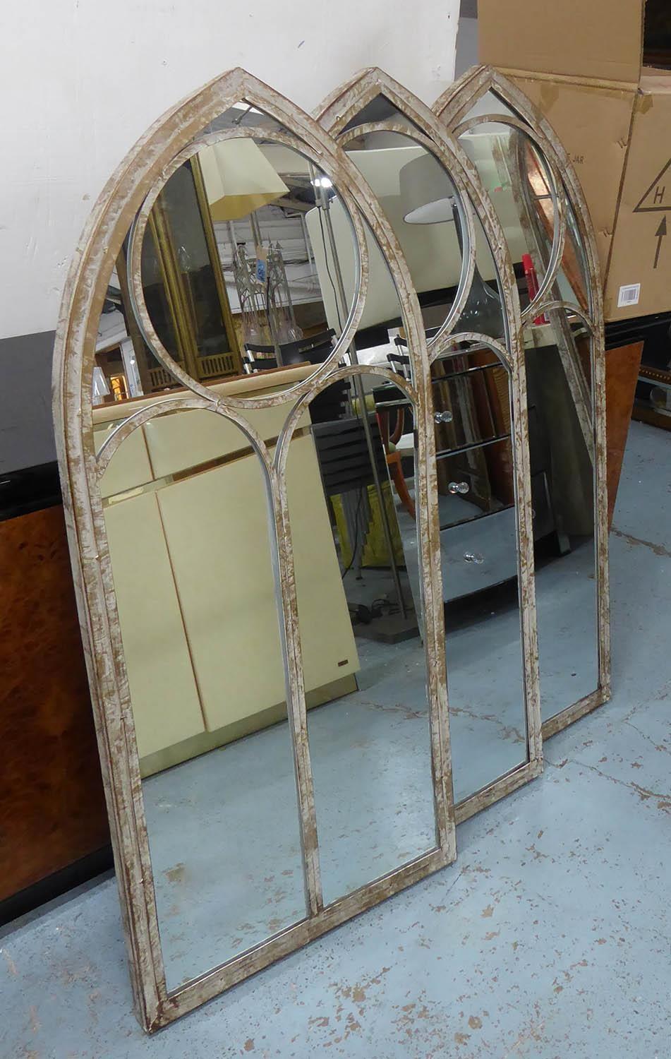 GARDEN WALL MIRRORS, a set of three, Gothic style, 122cm x 56cm. (3)