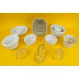 JELLY MOULDS, ten, including a stoneware mould with wheatsheaf motif, ceramic ironstone and three