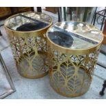 SIDE TABLES, a pair, gilt metal, mirrored tops, foliate barrel design, 50.5cm x 39.5cm D. (2)
