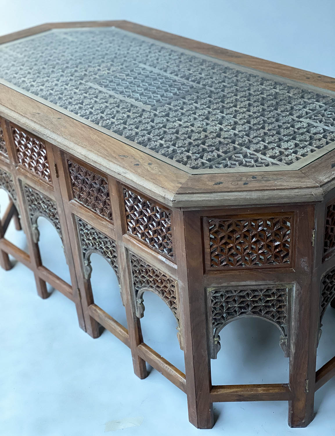 LOW TABLE, vintage Moorish teak and brass inlaid octagonal with pierced inset panels and glass - Image 6 of 7