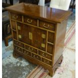 SIDE CABINET, Korean with a variety of drawers, dummy drawers and a central cupboard with gilt