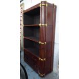 BOOKCASE, brown leather bound and brass mounted with open shelves above two drawers, 115cm x 44cm