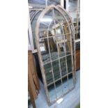 GARDEN MIRRORS, a set of three, arched top, metal frames. (3)