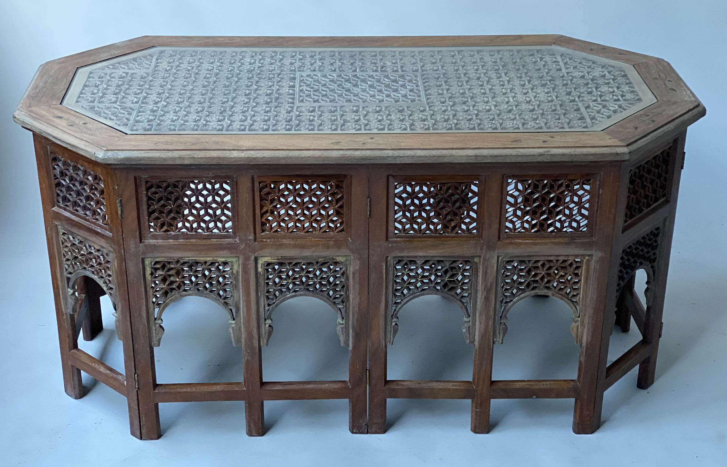 LOW TABLE, vintage Moorish teak and brass inlaid octagonal with pierced inset panels and glass