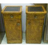 BEDSIDE CABINETS, a pair, 19th century and later karelian birch, each with black leather top above a