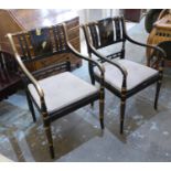 OPEN ARMCHAIRS, a pair, Regency style, black and gilt with painted Oriental bird detail and check