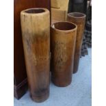 BAMBOO WATER VESSELS, a set of three, 86.5cm H at tallest.