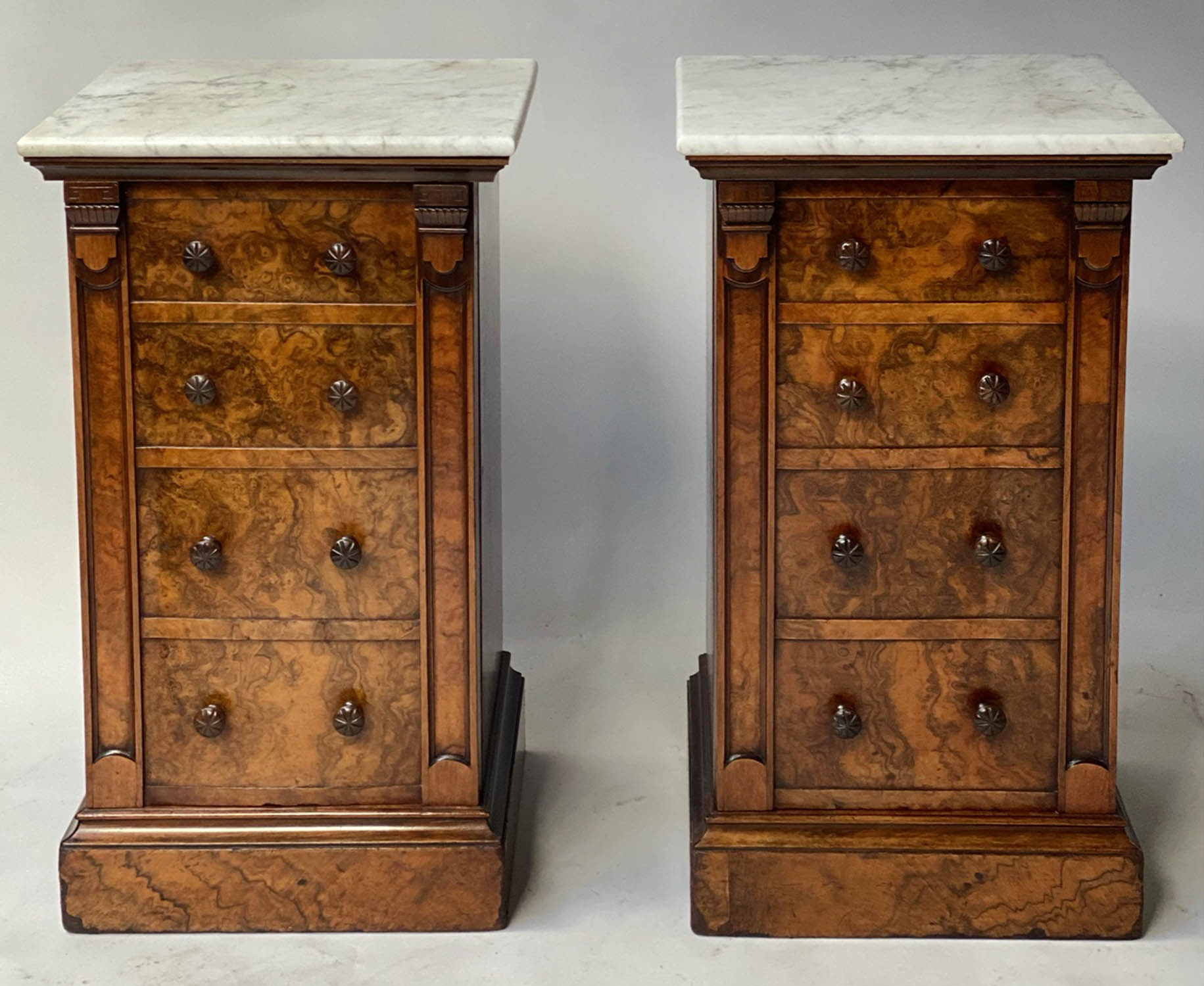 SIDE CABINETS, a pair, Victorian burr walnut each adapted with marble top above a panelled door