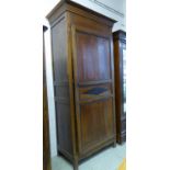 ARMOIRE, Directoire fruitwood and ebonised with a single lozenge panelled door enclosing a shelf and
