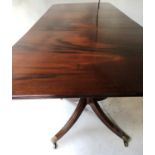 TILLMAN TWO PILLAR DINING TABLE, Regency design figured mahogany with two additional leaves and twin