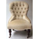 SLIPPER CHAIR, Victorian style yellow velvet with button back and turned supports.
