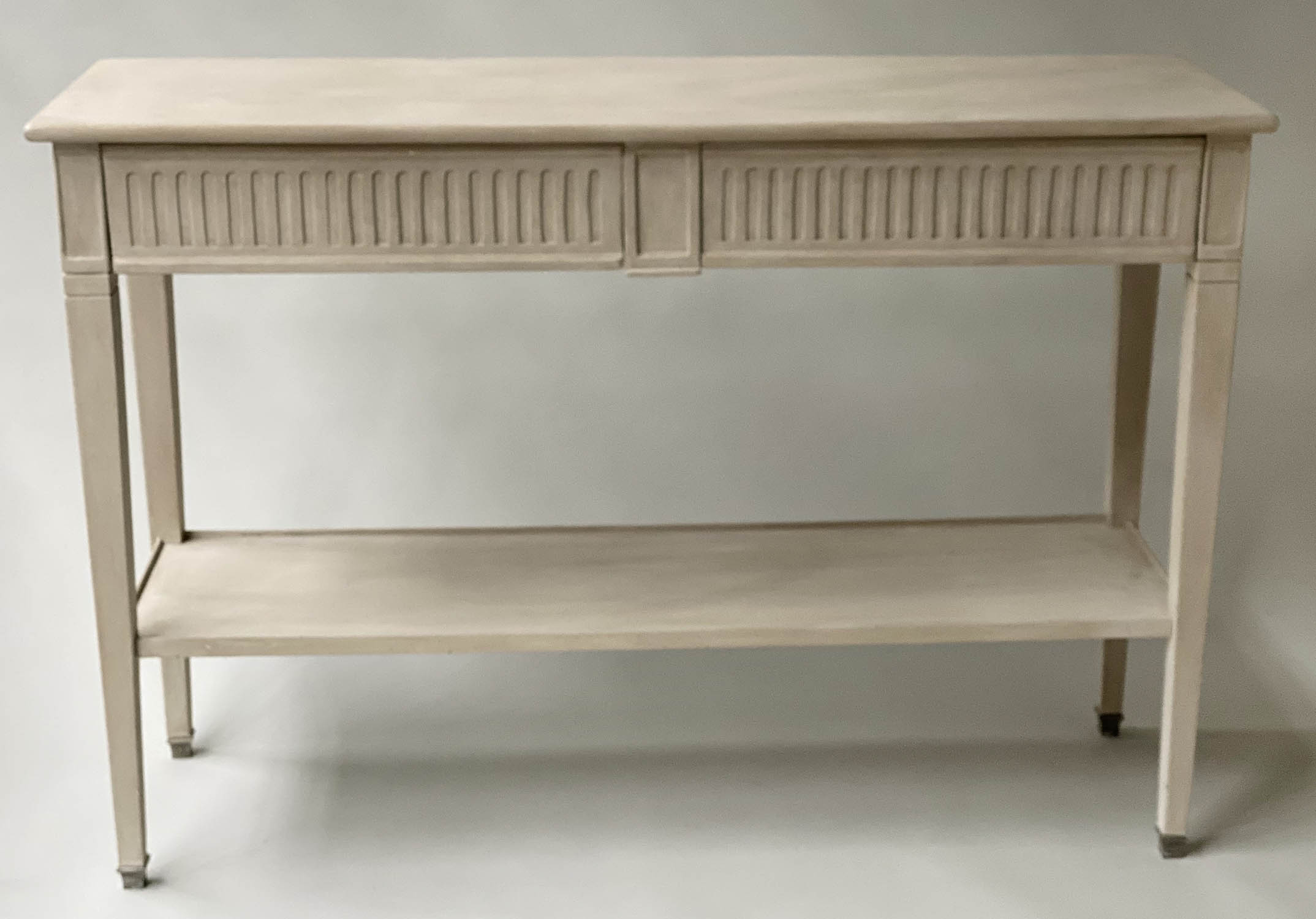 CONSOLE TABLE, French Louis XVI design grey painted and silvered metal with two fluted frieze