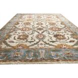 FINE CONTEMPORARY OUSHAK CARPET, 570cm x 428cm, all over palmette and vine design