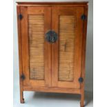 WARDROBE, 20th century Japanese firwood with twin cane panelled doors enclosing hanging and