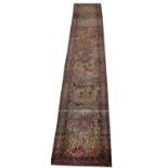 FINE ANTIQUE KERMAN LAVER RUNNER, 462cm x 80cm.