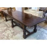 REFECTORY TABLE, late 19th/early 20th century oak with a rectangular plank top and carved lunette