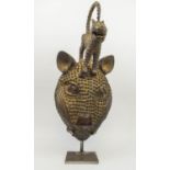 BENIN LEOPARD HEAD, mounted with stylised leopard, 70cm H x 30cm.