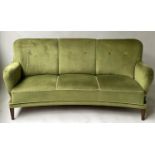 BANANA SOFA, mid 20th century Danish with moss green velvet button upholstery and turned teak