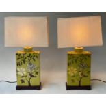 TABLE LAMPS, a pair, Chinese ceramic lime green depicting birds of paradise amongst tree blossom,