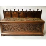 HALL BENCH, mid 19th century walnut with carved arched panelled trefoil crests and original tapestry
