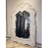 GUSTAVIAN STYLE WALL MIRROR, 18th century design traditionally white painted carved frame with a