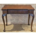 CARD TABLE, George II mahogany with projecting cornered foldover top revealing green baize and