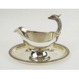 CHRISTOFLE GRAVY BOAT, empire style with eagles head and engine turned acanthus leaf detailed