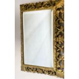 FLORENTINE MIRROR, 19th century carved giltwood with rectangular pierced cushion foliate flame,