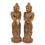 SOUTHEAST ASIAN DEITIES, a pair, carved giltwood. 81cm H (2).