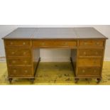 PARTNERS DESK, late Victorian mahogany with tripartite black leather top above nine drawers