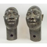 BENIN HEADS, a pair, cast bronze, 45cm H. (2)