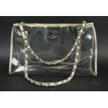 CHANEL TRANSPARENT PVC TOTE BAG, silver leather trim and interwoven adjustable chain, one main