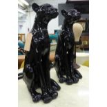 PANTHERS, a pair, black faux glazed finish, 73cm H. (2)